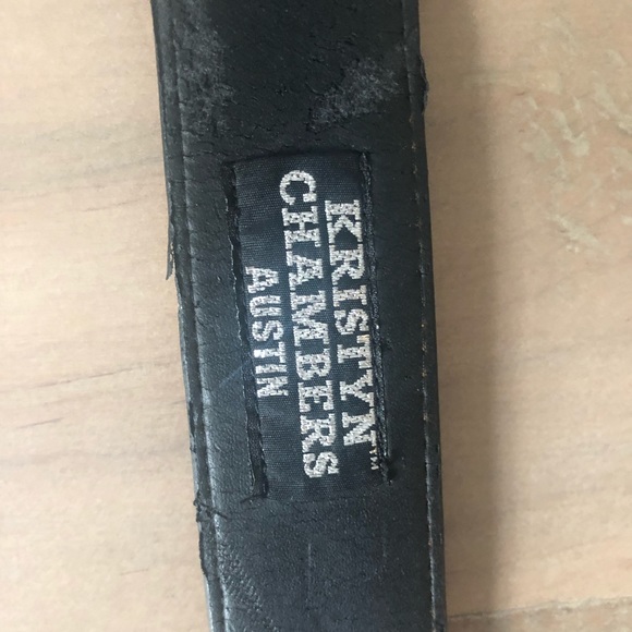 Kristyn Chambers orange suede longhorn belt.